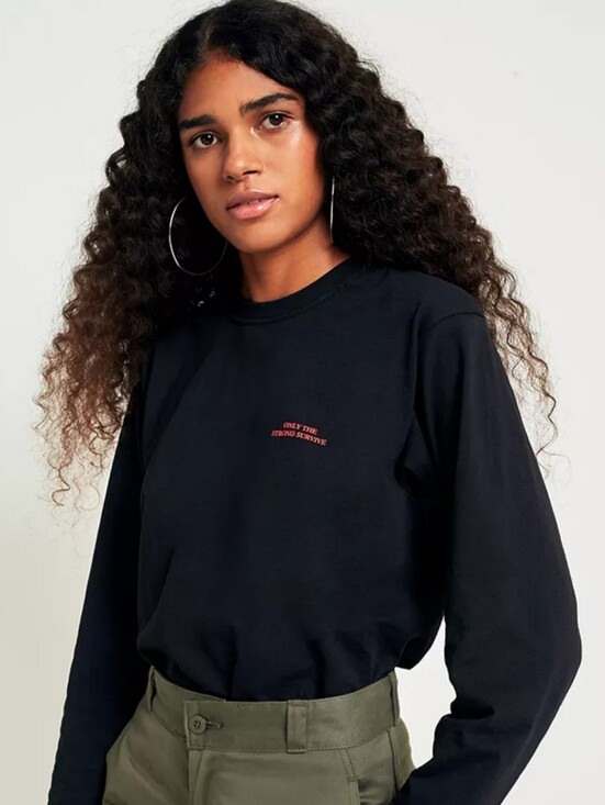 Urban Outfitters Tops - Urban Outfitters Light Before Dark Only The Strong Survive Cropped Long Sleeve